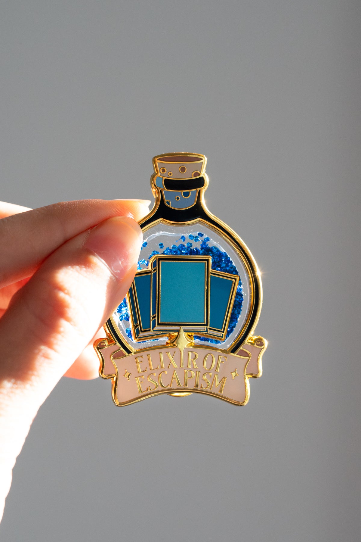 Elixir of Escapism Liquid Glitter Enamel Pin