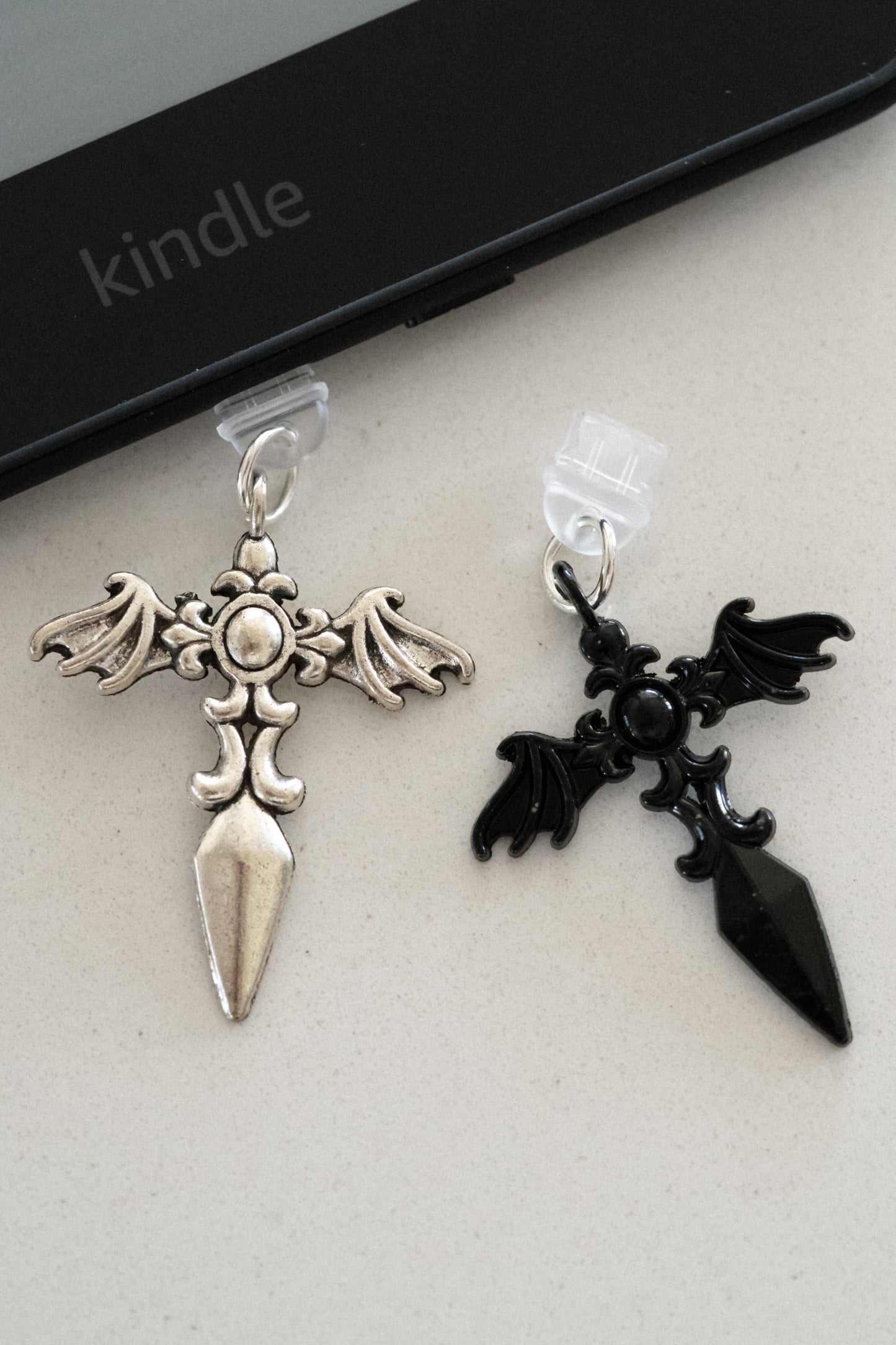 Winged Sword Kindle Dust Plug Charm