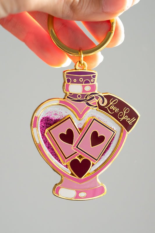 Book Love Spell Potion Liquid Glitter Enamel Keychain