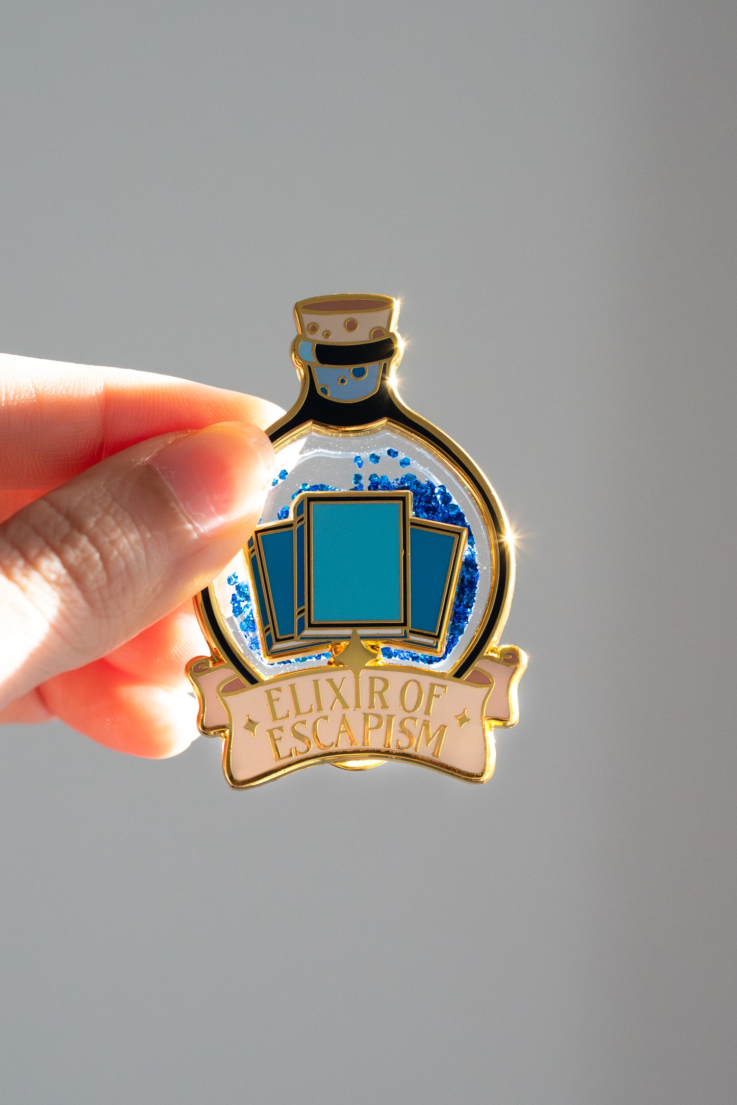 Elixir of Escapism Liquid Glitter Enamel Pin